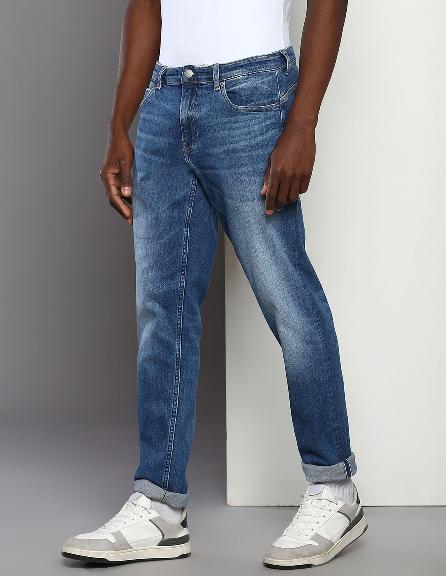 Calvin Klein Jeans Mid Rise Body Tapered Fit Jeans