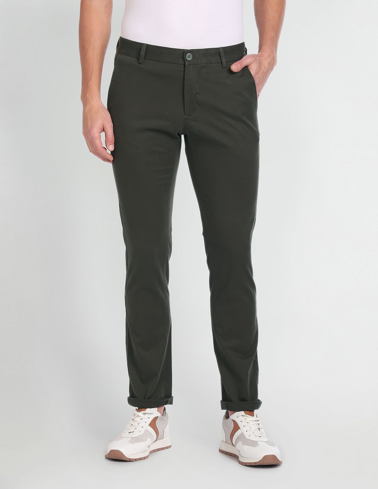 Buy Arrow Sports Flat Front Solid Casual Trousers NNNOW