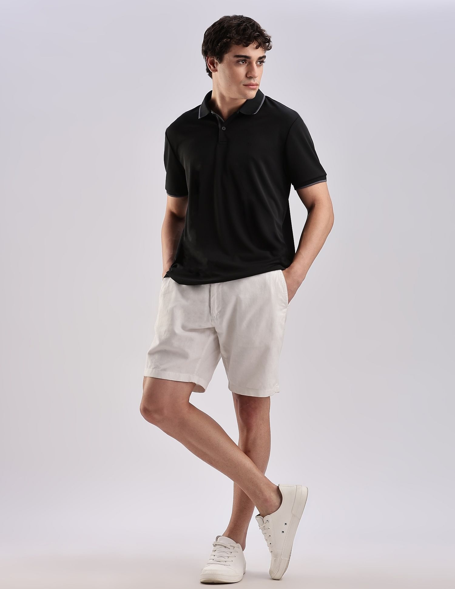 Calvin Klein Jeans Regular-Fit Solid Polyester Polo Shirt