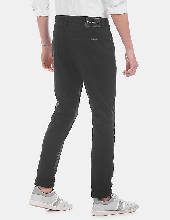 Buy Calvin Klein Men Black Solid Regular Fit Cotton Casual Pants 