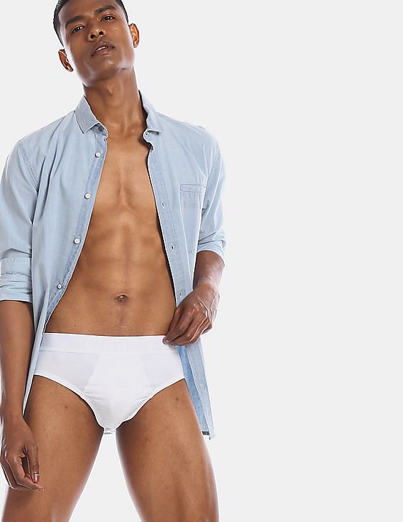 Buy Calvin Klein Underwear Men White Elasticized Waist Solid Hip Briefs -  NNNOW.com