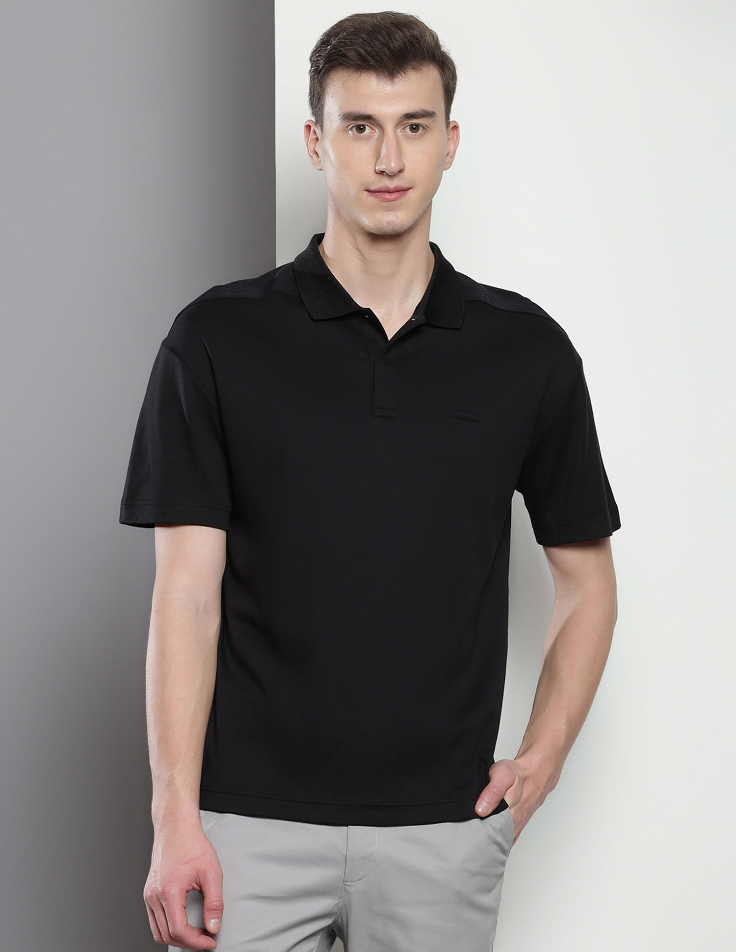 Calvin Klein Tonal Debossed Logo Polo Shirt