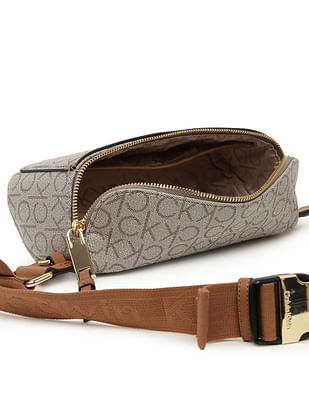 【レディース】  Millie Monogram Belt バッグ Calvin Klein Millie Monogram Belt Bag in Brown | Lyst