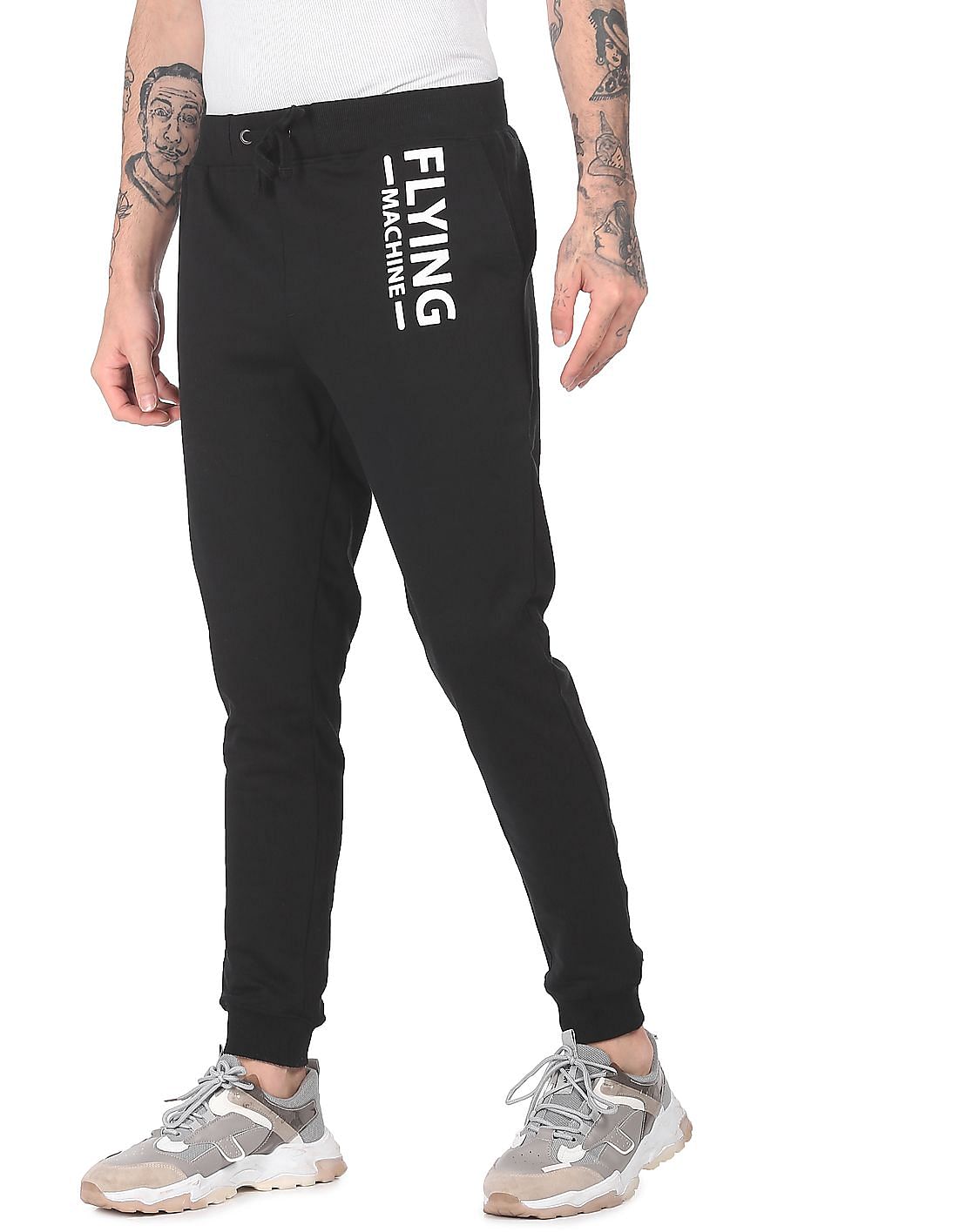 Buy Flying Machine Men Black Mid Rise Solid Joggers - NNNOW.com