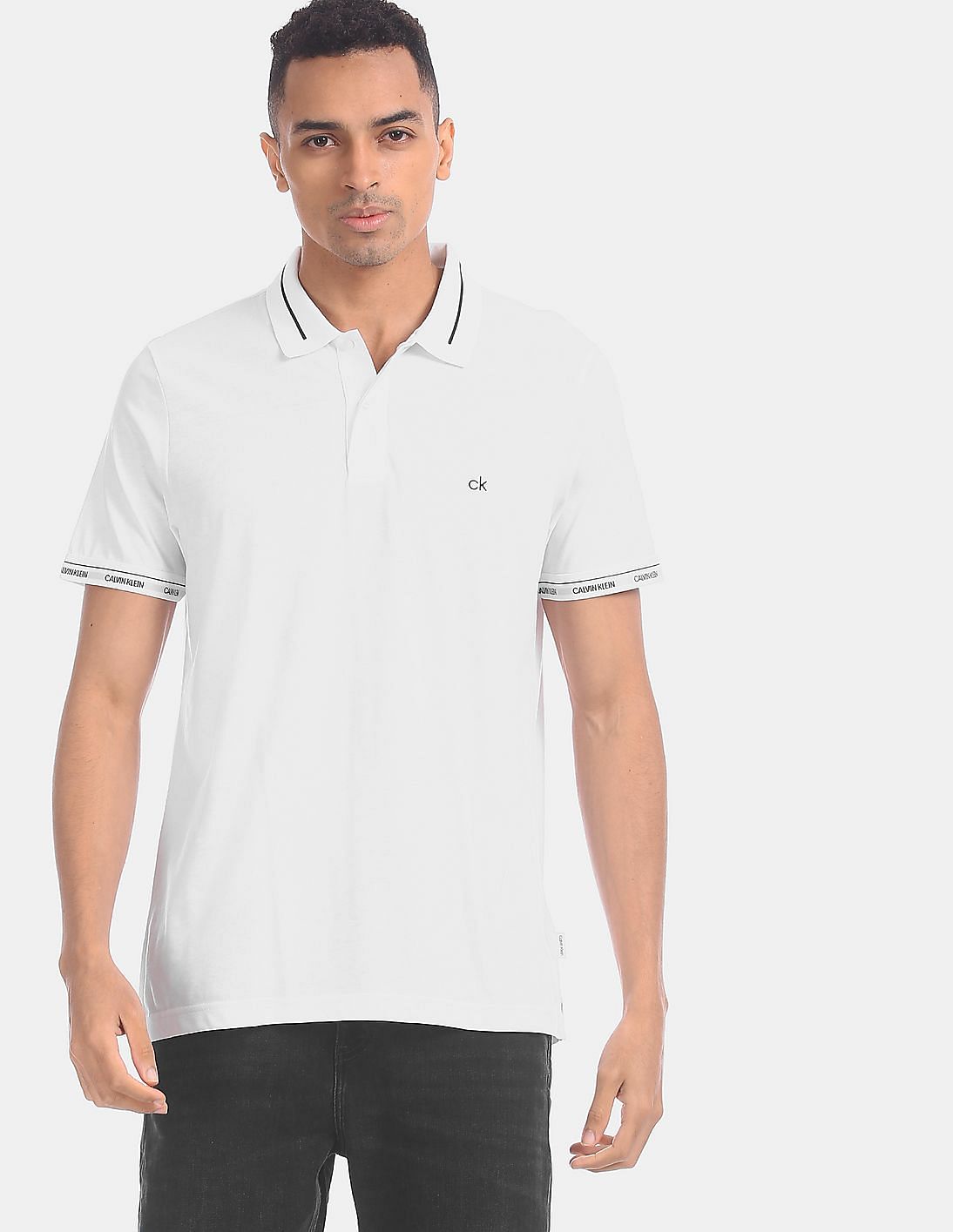 Buy Calvin Klein Men White Liquid Touch Logo Cuff Solid Polo Shirt ...