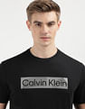 Calvin Klein Knockout Logo Graphic Print T-Shirt