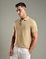 Tommy Hilfiger Solid Regular-Fit Cotton Polo Shirt