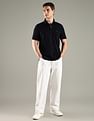 Tommy Hilfiger Solid Regular Fit Cotton Polo T-Shirt