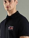 Tommy Hilfiger Solid Regular Fit Cotton Polo T-Shirt